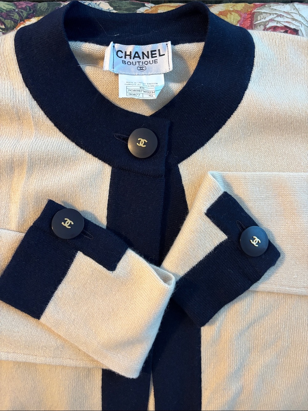 CHANEL Women’s Cream & Navy Cashmere Knit Cardigan with Logo Buttons